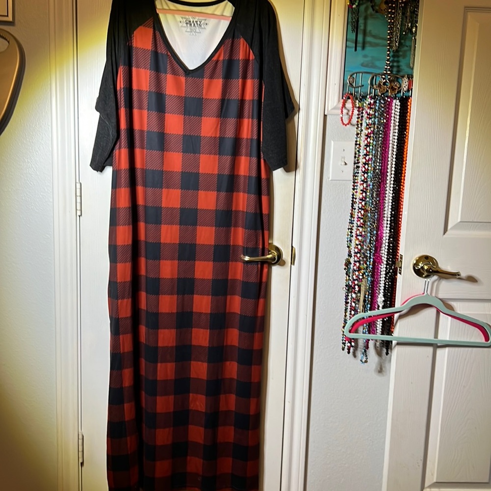 Red and black Buffalo print Maxi with pockets and side slits.